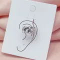 Silver-tone metal woven texture ear cuff, chic niche design, stylish versatile fashion accessory. - Silver Three-Dimensional Woven Texture Style