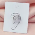 Silver metal ear cuff with sparkling rhinestones, trendy designer style non piercing accessory. - Silver Arc Pattern Inlaid Style