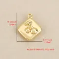 Close up view of gold diamond shaped cherry pendant, highlighting metallic embossed details. - Gold