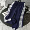 Plus size casual pants detail showing white lace side stripes and adjustable drawstring waist. - 1XL / Bottoms / Navy Blue