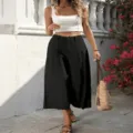 Detailed view of women high waist black cropped wide leg pants, casual style outfit scene. - S / Black