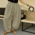 Detail view of women's casual loose harem pants, elastic waist, lightweight summer wear. - XS / Bottoms / Matcha Green