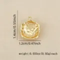 Detailed view of irregular gold plated metal pendant charm, perfect for DIY jewelry making. - Gold