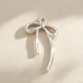 Minimalistische glanzende asymmetrische strik hanger DIY sieraden accessoire detail - Zilveren strik