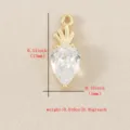 Mini gold carrot pendant with clear cubic zirconia crystal, delicate DIY jewelry charm detail. - Gold