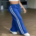 Blue wide-leg sweatpants for women, featuring dual white side stripes, elastic drawstring waist. - XS / Bottoms / Blue