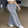 Pantaloni larghi grigi casual con strisce laterali bianche ed elastico in vita con coulisse. - Grigio Argento
