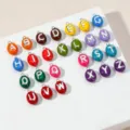 Close-up detail of colorful enamel letter charms, double-sided alphabet DIY pendants set. - Silver Letter-Rose Red (C)