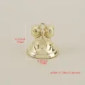 Gold plated Christmas bell pendant detail view, compact 12mm size for DIY holiday jewelry making. - Gold