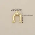 Gold plated horseshoe charm pendant detail view, perfect for DIY jewelry making and crafting. - Gold