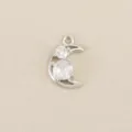 Silver tone copper crescent moon pendant with sparkling cubic zirconia stones for DIY jewelry making. - Silver