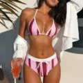 Stunning striped two-piece bikini swimsuit featuring halter neck, string details, and cute pink design. - S / Top And Bottom / Red Stripes