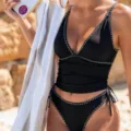 Black two-piece bikini swimsuit for women with stylish beaded trim and side tie details. - S / Top And Bottom / Black