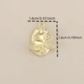 Gold plated oval pendant detail, geometric relief bow design with sparkling cubic zirconia. - Gold