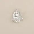 Detailed shot of silver plated butterfly pendant with sparkling cubic zirconia DIY jewelry. - Silver
