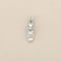 Silver ballet shoe pendant with sparkling cubic zirconia and bow, ideal for DIY jewelry making. - Silver