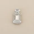 Detailed shot of silver lucky bag pendant, intricate rope pattern DIY jewelry accessory. - Silver