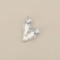 Flip-flop pendant detail showing silver-plated copper and sparkling zircon stone inlay. - Silver