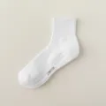 White athletic socks for men, cotton sports crew socks with grip soles and ribbed cuffs. - Crew Socks / White