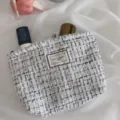 Elegant tweed makeup bag for women, stylish portable cosmetic pouch with large capacity storage. - White