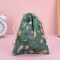 Sacchetto con coulisse in tessuto verde con stampa di foglie, piccola borsa di cotone. - Foglia Verde