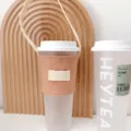 Einfarbiger Leinen Becherhalter mit Tragegurt, wiederverwendbarer Getränkebecher Halter für Kaffee. - Fleischrosa