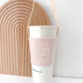 Tragbarer Segeltuch Becherhalter mit Tragegurt, minimalistische bunte Isolierhülle für Getränke. - Hellrosa