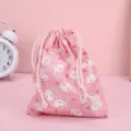 Mini borsetta con coulisse in cotone rosa con stampa di coniglietto per monete e rossetto. - Alieno Rosa