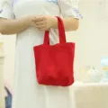Red canvas tote bag, portable lunch box handbag for students and office workers daily use. - Red
