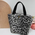 Borsa tote in tela con stampa leopardata in bianco e nero, comoda borsa pranzo portatile. - Anelli Leopardati Neri
