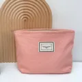 Rosa Canvas Kosmetiktasche mit Reissverschluss, tragbare Reiseaufbewahrung fuer Alltag. - Rosa