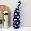 Custodia per bottiglia d'acqua in tela giapponese con stampa Shiba Inu e manico. - Testa di Cane Blu Multicolore