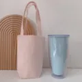 Rosa Kaffeetasse Beutel aus Leinen mit doppelten Griffen, tragbare Tragetasche für Becher. - Oberer Griff / Hellrosa