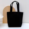 Schwarze einfarbige Segeltuch Tragetasche, schlichte Schülertasche Kosmetik Aufbewahrungstasche. - Schwarz