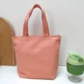 Einfarbiges Segeltuch Lunchtasche Handtasche Tragetasche fuer Studenten und Alltag. - Rosa
