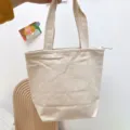 Einfarbige Canvas-Mittagstasche mit Reißverschluss, lässige Handtasche für den Alltag. - Gebrochenes Weiß