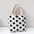 Black and white polka dot canvas tote bag with snap closure and fabric handles for daily use. - Black White Polka Dot