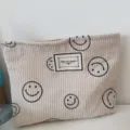 Kordsamt Smiley Kosmetiktasche, tragbare Reißverschluss Make-up Tasche und Aufbewahrung für Mädchen. - Reisgrauer Cord Smiley