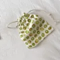 Kiwi Druck Leinen Kordelzug Aufbewahrungstasche tragbare Reise Make-up Tasche Detailansicht. - Kiwi