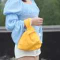 Yellow Japanese knot wrist bag, casual fabric mini tote purse for daily essentials, stylish variant. - Old Yellow