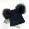 Black double pom pom knit beanie winter warm cozy cute fluffy hat stylish detail view - Black