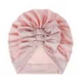 Soft pink baby turban hat detail featuring cute triple knot bows and comfortable knit fabric. - One Size / Pink