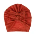 Cute baby turban hat with triple bow knots, soft knitted pleated headwear for infants. - One Size / Rust red