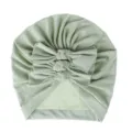 Detail shot of soft knit infant turban hat with cute bows, lightweight baby headwear. - One Size / Light Green