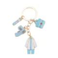 Cute medical theme alloy keychain featuring doctor coat and emergency bag charms. - Blue