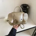 Süße goldene Elefanten Handtasche, stilvolle Mini Cartoon Umhängetasche für Damen. - Gold