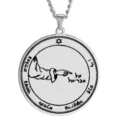 Close-up detail of stainless steel Solomon seal pendant with engraved Hebrew occult symbols. - Size 22