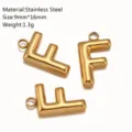 Ciondolo lettera F in acciaio inossidabile per gioielli fai da te, colore oro, 9x16mm. - Ciondolo Lettera F / Oro