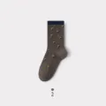 Cotton mid-calf socks for women featuring brown color with blue and yellow geometric square patterns. - One Size / Dark Coffee
