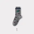 Grey cotton mid-calf socks with brown polka dots, green dog pattern and navy ruffled cuff. - One Size / Gray